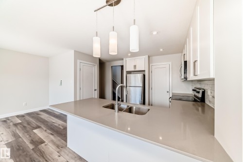 55 Ebbers Close, Edmonton, AB - Indoor Photo Showing Kitchen With Double Sink With Upgraded Kitchen