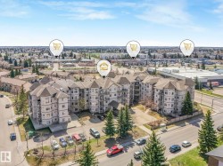 Multi-story residential complex featuring multiple balconies and bay window architectural elements - 
