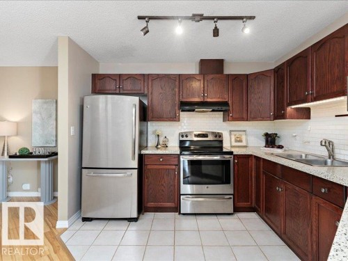 204 9640 105 Street, Edmonton, AB - Indoor Photo Showing Kitchen With Double Sink