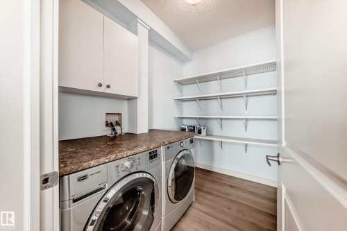 308 1623 James Mowatt Trail, Edmonton, AB - Indoor Photo Showing Laundry Room