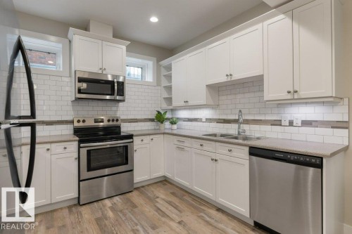 7931 112S Avenue, Edmonton, AB - Indoor Photo Showing Kitchen With Double Sink