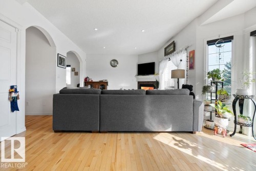715 Wildwood Point(E), Edmonton, AB - Indoor Photo Showing Living Room With Fireplace
