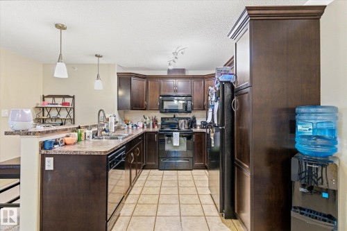 410 7909 71 Street, Edmonton, AB - Indoor Photo Showing Kitchen With Double Sink