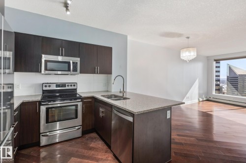 2304 10152 104 Street, Edmonton, AB - Indoor Photo Showing Kitchen With Double Sink With Upgraded Kitchen