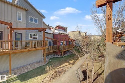 Multi-level exterior decks with wooden railings and pergolas - 210 401 Southfork Drive, Leduc, AB - Outdoor With Deck Patio Veranda