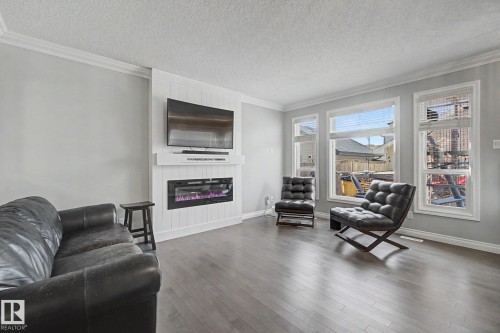 3724 Alexander Crescent, Edmonton, AB - Indoor Photo Showing Living Room With Fireplace