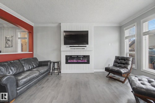 3724 Alexander Crescent, Edmonton, AB - Indoor Photo Showing Living Room With Fireplace