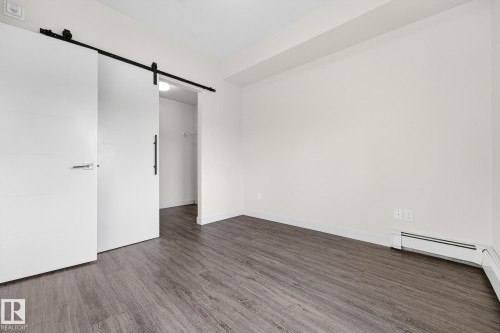 304 10837 83 Avenue, Edmonton, AB - Indoor Photo Showing Other Room