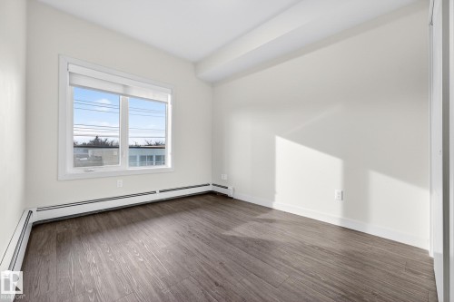 304 10837 83 Avenue, Edmonton, AB - Indoor Photo Showing Other Room