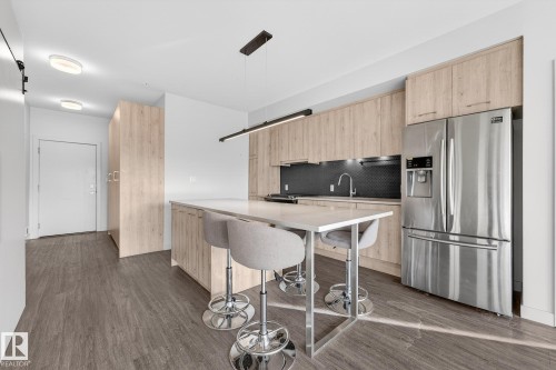 304 10837 83 Avenue, Edmonton, AB - Indoor Photo Showing Kitchen With Stainless Steel Kitchen