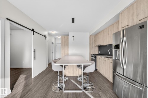 304 10837 83 Avenue, Edmonton, AB - Indoor Photo Showing Kitchen With Stainless Steel Kitchen