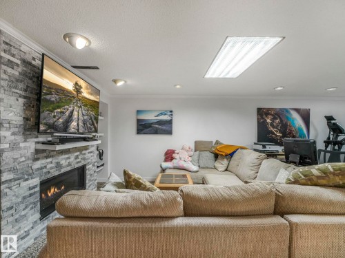 10629 167A Avenue, Edmonton, AB - Indoor Photo Showing Living Room With Fireplace