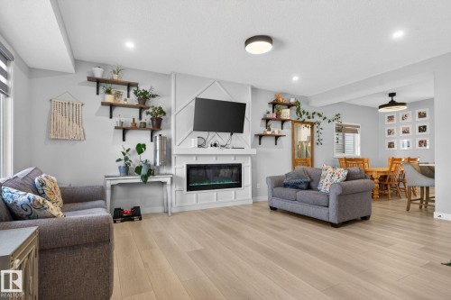 60 Treble Landing, Spruce Grove, AB - Indoor Photo Showing Living Room With Fireplace