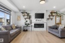 60 Treble Landing, Spruce Grove, AB  - Indoor Photo Showing Living Room With Fireplace 