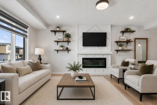 60 Treble Landing, Spruce Grove, AB - Indoor Photo Showing Living Room With Fireplace