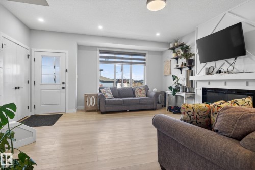 60 Treble Landing, Spruce Grove, AB - Indoor Photo Showing Living Room With Fireplace