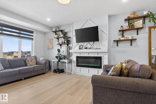 60 Treble Landing, Spruce Grove, AB - Indoor Photo Showing Living Room With Fireplace