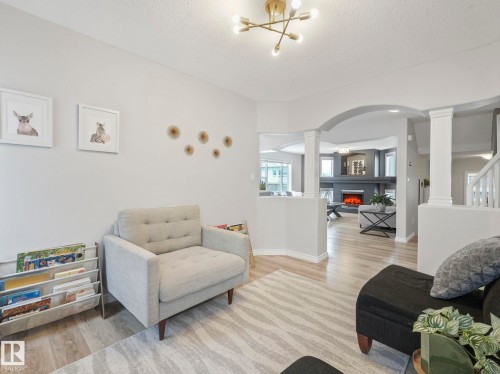 71 Rue Bouchard, Beaumont, AB - Indoor Photo Showing Living Room