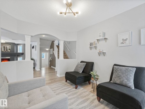71 Rue Bouchard, Beaumont, AB - Indoor Photo Showing Living Room