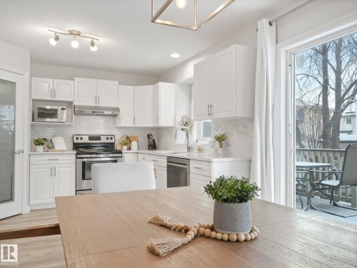 71 Rue Bouchard, Beaumont, AB - Indoor Photo Showing Kitchen With Upgraded Kitchen