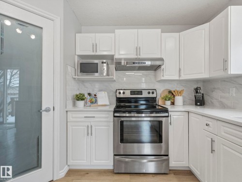 71 Rue Bouchard, Beaumont, AB - Indoor Photo Showing Kitchen With Upgraded Kitchen