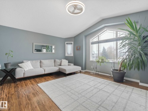 71 Rue Bouchard, Beaumont, AB - Indoor Photo Showing Living Room