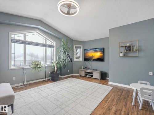 71 Rue Bouchard, Beaumont, AB - Indoor Photo Showing Living Room
