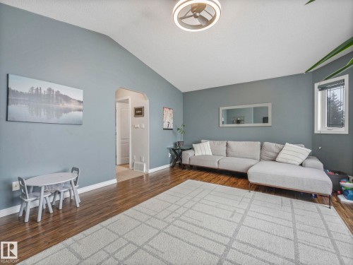 71 Rue Bouchard, Beaumont, AB - Indoor Photo Showing Living Room