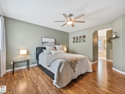71 Rue Bouchard, Beaumont, AB - Indoor Photo Showing Bedroom