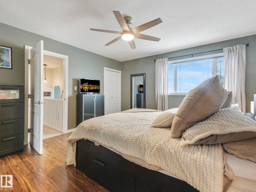 71 Rue Bouchard, Beaumont, AB - Indoor Photo Showing Bedroom