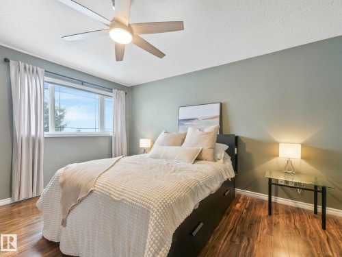 71 Rue Bouchard, Beaumont, AB - Indoor Photo Showing Bedroom