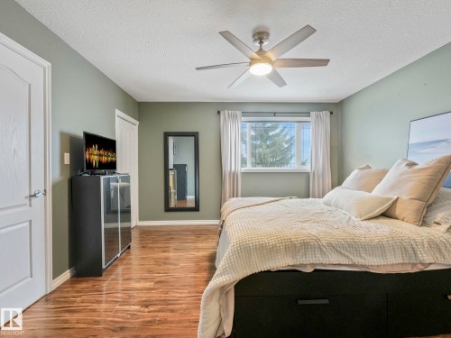 71 Rue Bouchard, Beaumont, AB - Indoor Photo Showing Bedroom