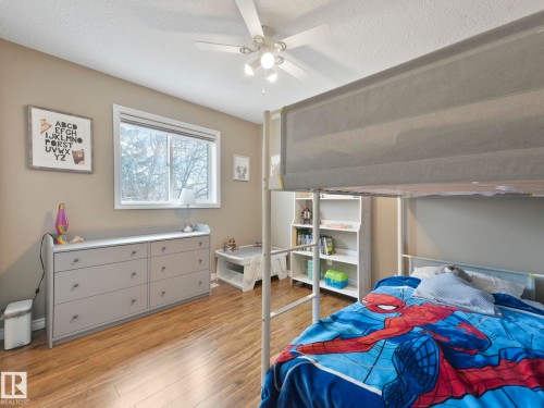 71 Rue Bouchard, Beaumont, AB - Indoor Photo Showing Bedroom