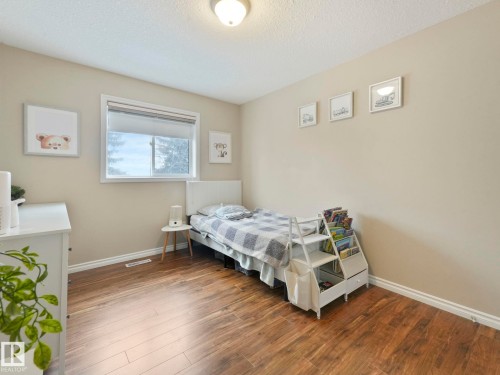 71 Rue Bouchard, Beaumont, AB - Indoor Photo Showing Bedroom