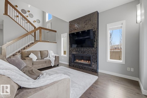 1251 Secord Landing, Edmonton, AB - Indoor Photo Showing Living Room With Fireplace