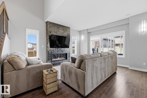 1251 Secord Landing, Edmonton, AB - Indoor Photo Showing Living Room With Fireplace