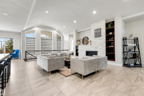 9055 24 Avenue, Edmonton, AB - Indoor Photo Showing Living Room With Fireplace