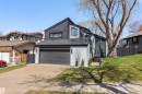 Contemporary-style residence featuring a dark gray facade with contrasting light gray brick accents - 38 Woodcrest Avenue, St. Albert, AB  - Outdoor 