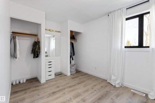 Room featuring light wood-finish flooring and white walls - 38 Woodcrest Avenue, St. Albert, AB - Indoor