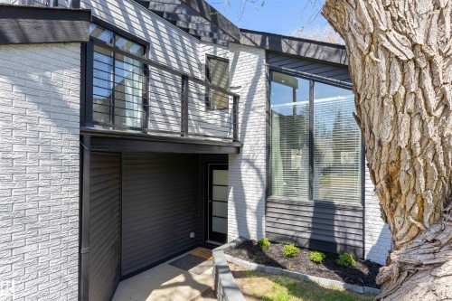 Contemporary exterior featuring white brick and dark horizontal siding - 38 Woodcrest Avenue, St. Albert, AB - Outdoor