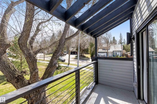 Private balcony featuring a concrete surface and black metal railing - 38 Woodcrest Avenue, St. Albert, AB - Outdoor With Exterior