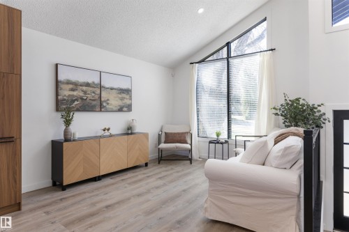 Angled ceiling with recessed lighting and a prominent triangular window - 38 Woodcrest Avenue, St. Albert, AB - Indoor