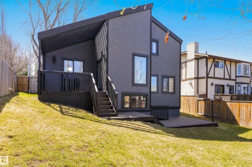 Contemporary exterior with dark siding and multiple geometric windows - 38 Woodcrest Avenue, St. Albert, AB - Outdoor