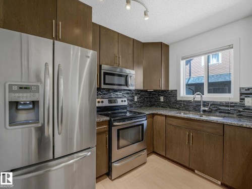 49 12004 22 Avenue, Edmonton, AB - Indoor Photo Showing Kitchen With Double Sink