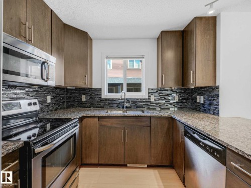 49 12004 22 Avenue, Edmonton, AB - Indoor Photo Showing Kitchen With Double Sink