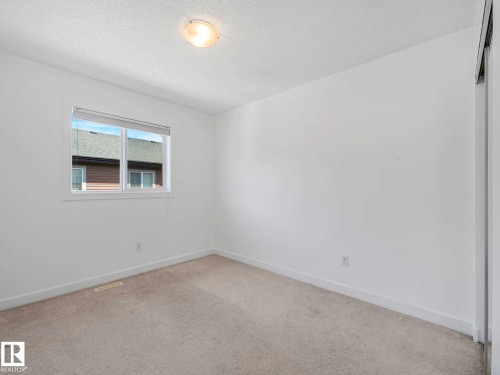 49 12004 22 Avenue, Edmonton, AB - Indoor Photo Showing Other Room
