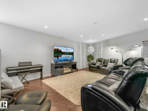 122 5151 Windermere Boulevard, Edmonton, AB - Indoor Photo Showing Living Room