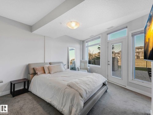 122 5151 Windermere Boulevard, Edmonton, AB - Indoor Photo Showing Bedroom