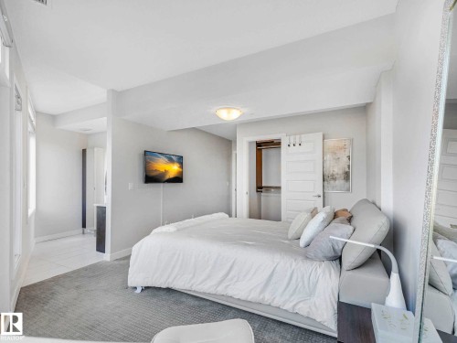122 5151 Windermere Boulevard, Edmonton, AB - Indoor Photo Showing Bedroom