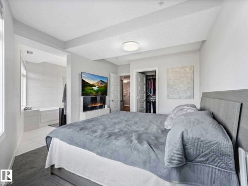 122 5151 Windermere Boulevard, Edmonton, AB - Indoor Photo Showing Bedroom